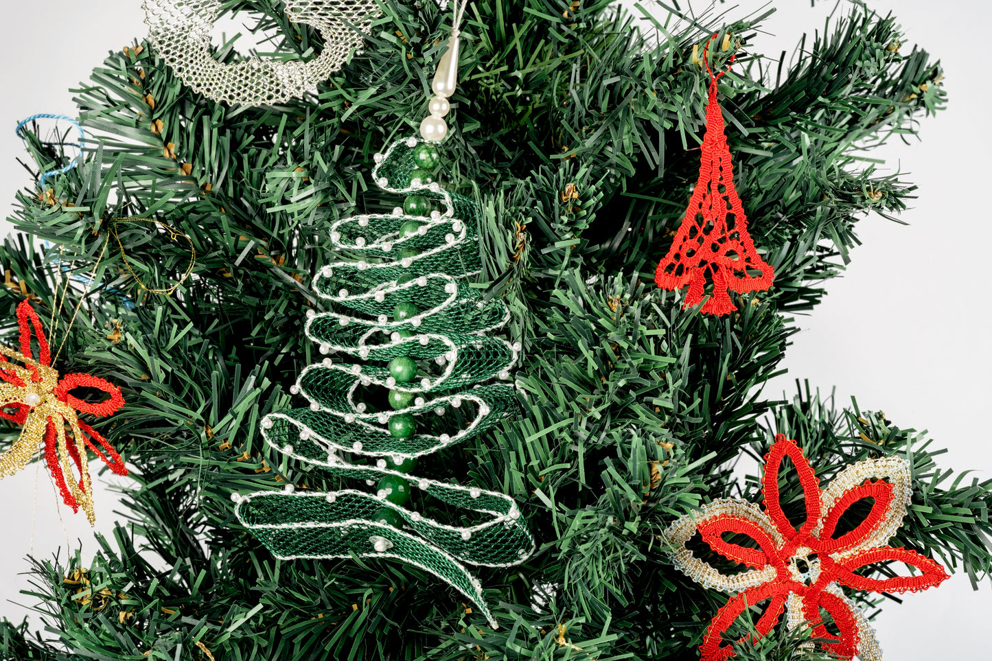 Lace Christmas tree decoration with beads