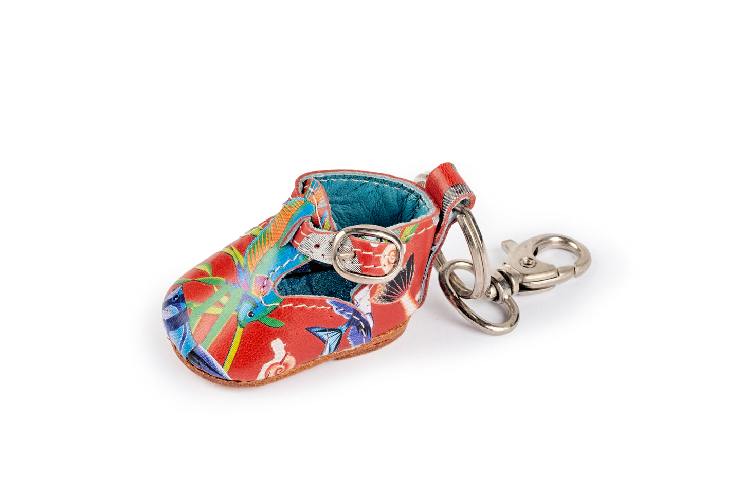 Red baby shoe keyring with fish pattern