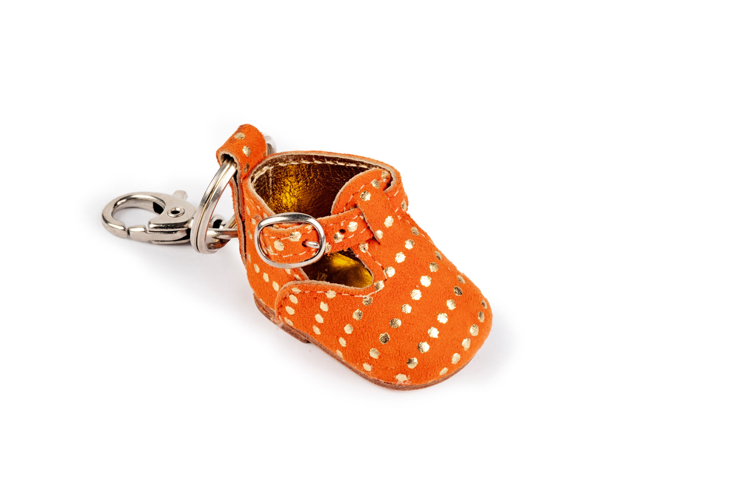 Orange baby shoe keychain with gold polka dots