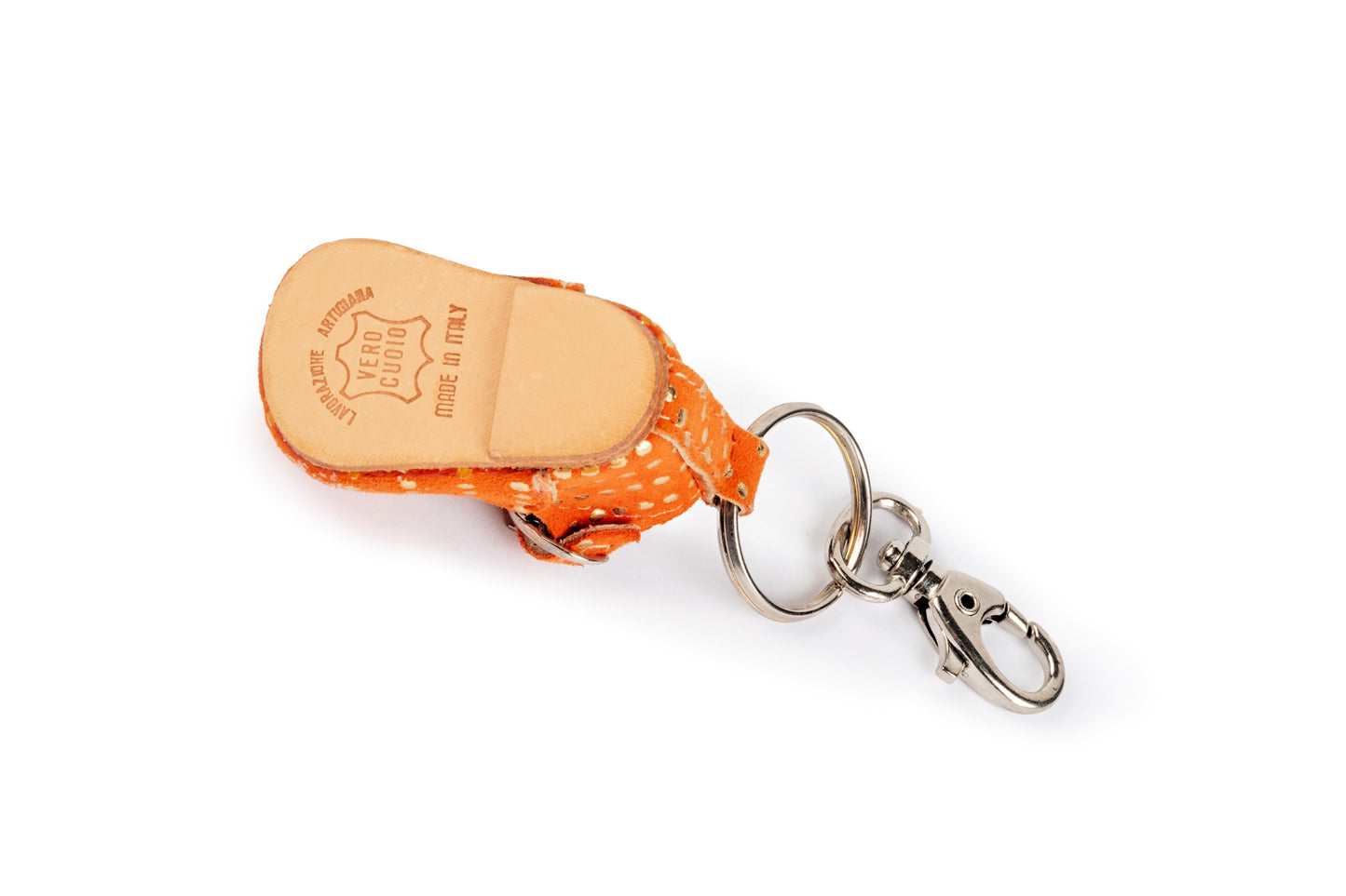 Orange baby shoe keychain with gold polka dots