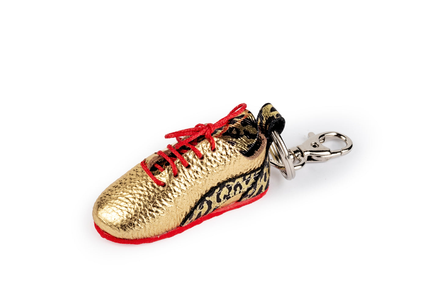 Spotted gold tennis shoe keychain