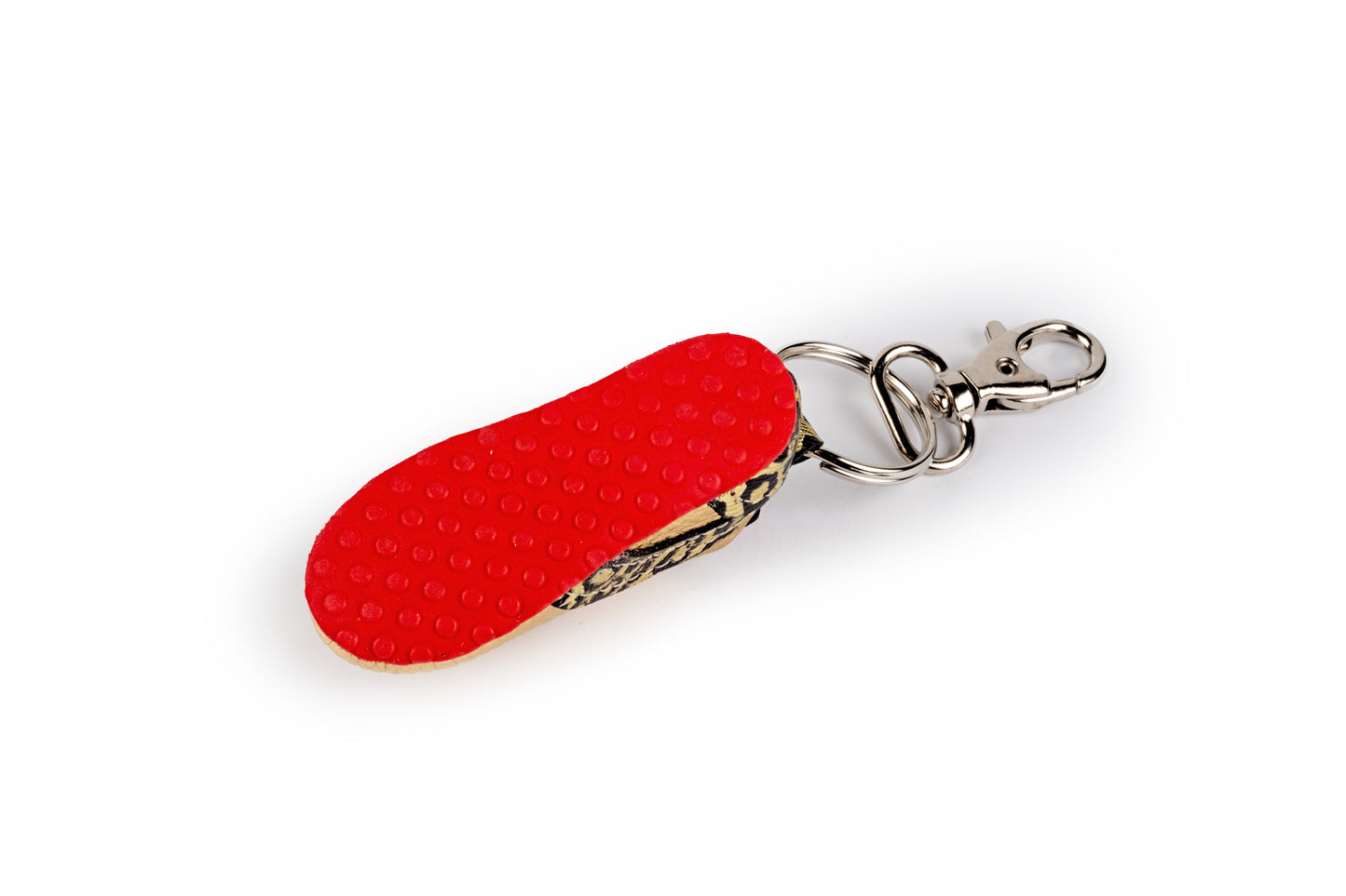Spotted gold tennis shoe keychain