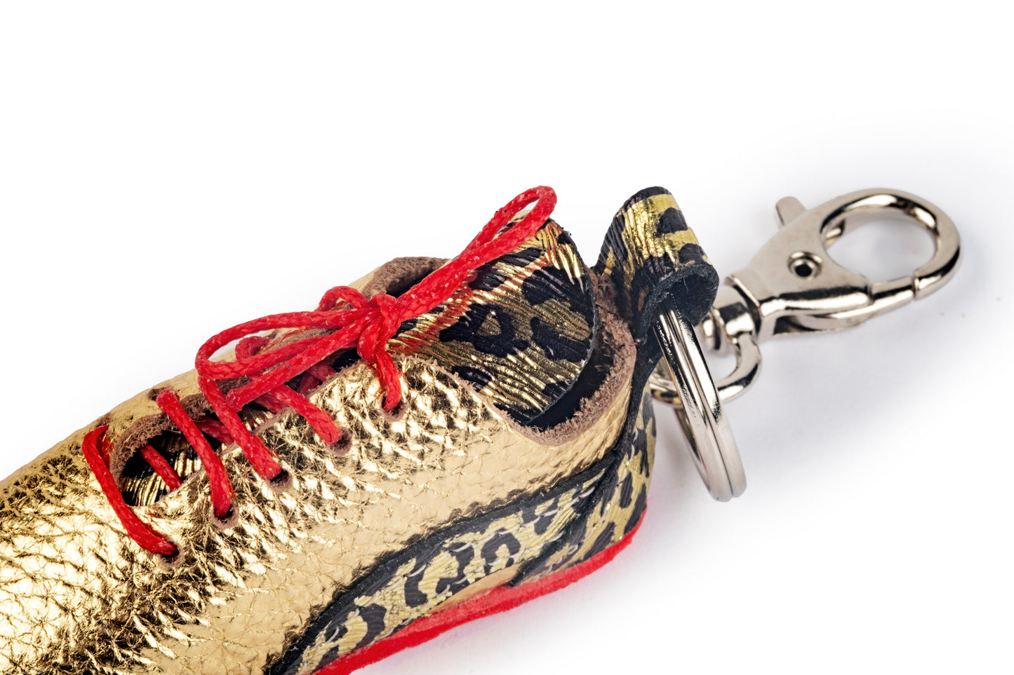 Spotted gold tennis shoe keychain