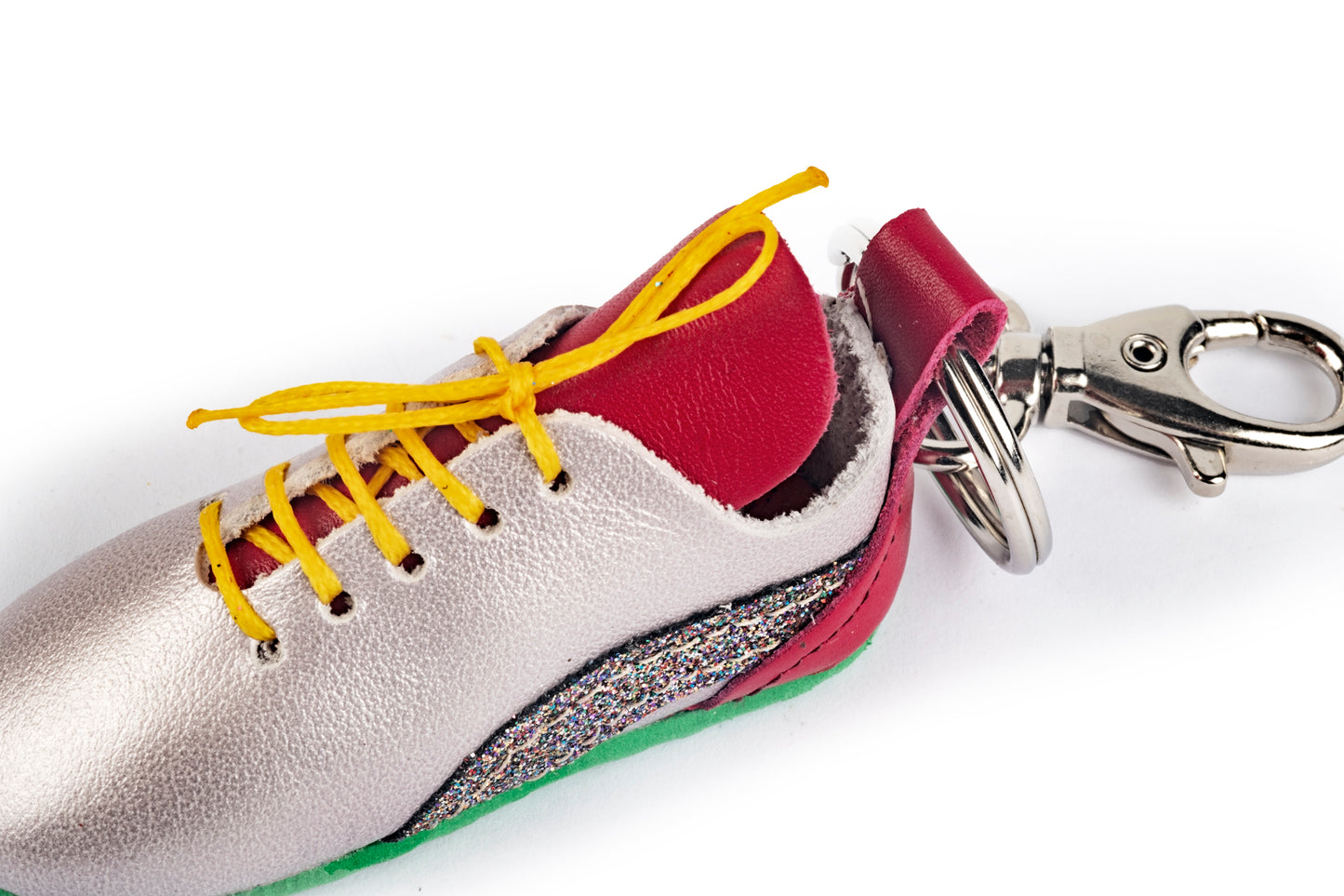 Silver, fuchsia, and glitter tennis shoe keyring